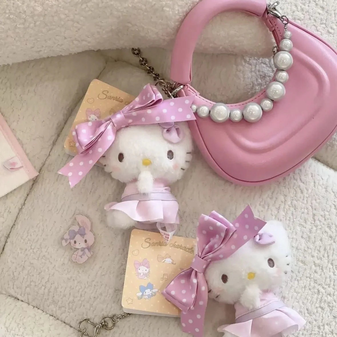 Hello Kitty Plush Bag Charm, Soft Stuffed Keychain with Pink Polka Dot Bow